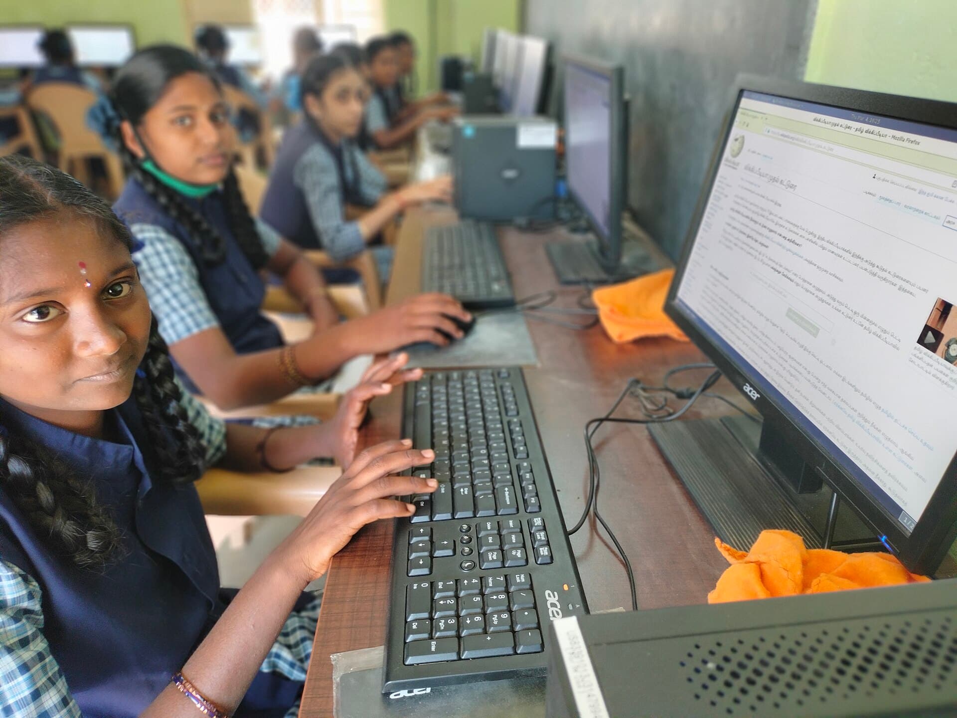 Students using computers in an education computer lab