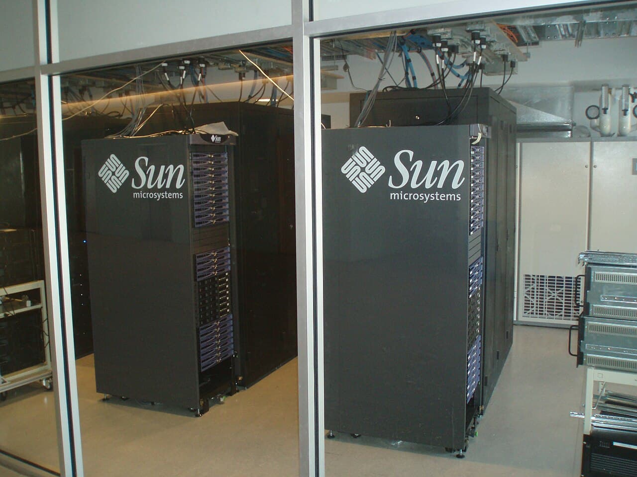 Rack-mounted enterprise servers and storage cabinets in a server room